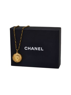 Chanel Gold Tone Sunburst Pendant Necklace