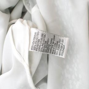 Mikael Aghal Green floral print dress with black lace trim 10