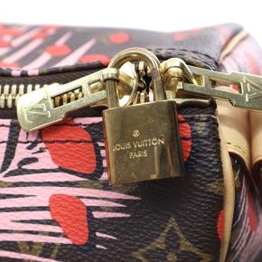 Louis Vuitton Coated Canvas Monogram Jungle Dots Keepall Bandouliere 50 6