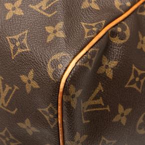Louis Vuitton Coated Canvas Monogram Sac Souple 55 6