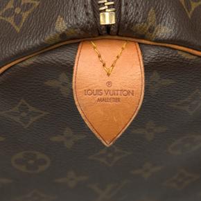 Louis Vuitton Coated Canvas Monogram Keepall 60 7