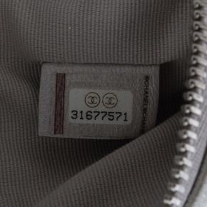 Chanel Silver Medium Quilted Metallic Caviar O Case Clutch 8