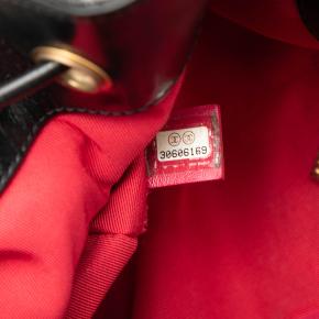 Chanel Black Shiny Aged Calfskin CC Chain Drawstring Bucket Bag 7