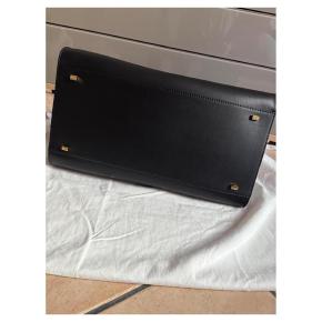 The Row Black Leather Margaux 15 4