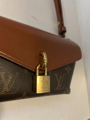 Louis Vuitton Coated Canvas And Leather Bag 12