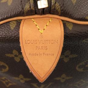 Louis Vuitton Coated Canvas Monogram Keepall 55 5