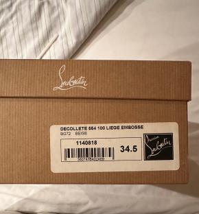 Louboutin Beige Python Print Pumps 5
