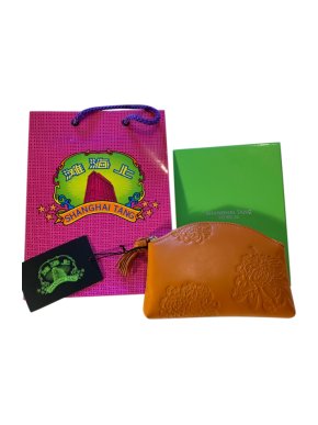 Shanghai Tang orange pebbled leather pouch
