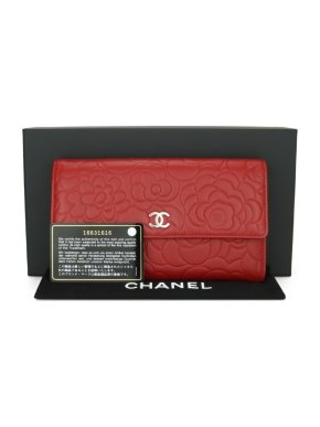 Chanel red leather camelia embossed flap wallet