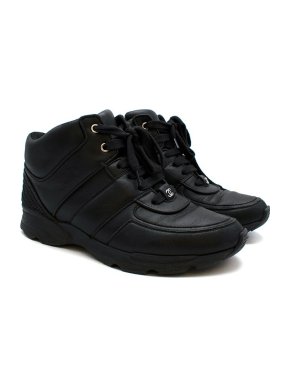 Chanel black leather mid-top trainers
