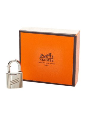 Hermes Cadena lock charm